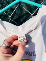 Women's or men's vintage 1980's Screen Stars label short sleeve off white cream graphic t-shirt with yellow, purple, and green joker graphic on the front.