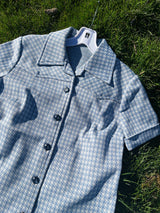 Women's vintage 1970's matching pant set with pants and button up shirt blouse in blue and white gingham polyester material.