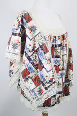 Women's vintage 1980's Lane Bryant label flutter sleeve blouse with cream lace trim and a square neckline. All over multicolored patchwork print.