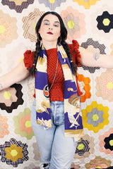 Women's vintage burnt orange acrylic crochet sweater top. Sleeveless with ruffles trim on shoulders. Has a short fit.