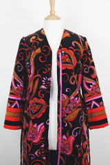 Women's vintage 1970's Dynasty label long sleeve long length velvet material puffy duster jacket in black, purple, and pink colors.