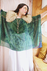 Women's vintage 1990's green and navy sheer polyester material cape top. Has no armholes, just a hole for your head. Tie dye print.