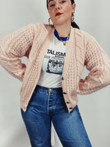 Women's vintage 1990's Karen Scott label long sleeve pale pink mohair button up cardigan with cable knit texture.