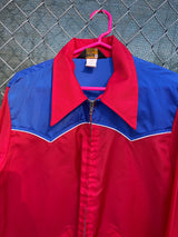 Women's or men's vintage 1970's Swingster, World of Wearables label long sleeve blue and red lightweight zip up windbreaker with a western style.