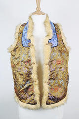 Women's vintage 1990's sleeveless vest with faux fur interior, a multicolored satin body, and faux fur trim.