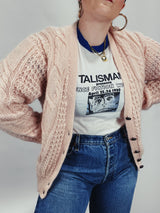 Women's vintage 1990's Karen Scott label long sleeve pale pink mohair button up cardigan with cable knit texture.