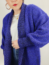 Women's vintage 1980's Fitting Image label long sleeve long length purple nubby cardigan with an open front.