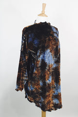 Long sleeve long length tie dye velvet top with a mock neck in a stretchy velvet material. Blue and brown colors with curly trim throughout.