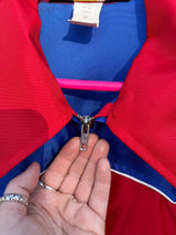 Women's or men's vintage 1970's Swingster, World of Wearables label long sleeve blue and red lightweight zip up windbreaker with a western style.