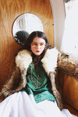 Women's vintage 1970's Dino Ricco, Made in Hong Kong label Penny Lane long sleeve genuine fur coat with a brown body and big cream fur trim on neck.