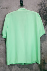 Women's vintage 1980's Sag Harbor label short sleeve lightweight lime green blazer with a one button closure. Rayon and Polyester material, perfect for Summer.
