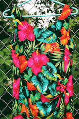 Women's vintage 1980's LA Belle, Made in USA label sleeveless mini dress in black with all over multicolored tropical floral print. Wrap tie detail in the front