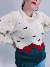 long sleeve cream pullover sweater with collar and mountain print