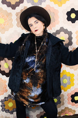 Women's vintage 1980's Luh - London, Paris, New York label long sleeve zip up jacket in black with genuine fir body and ribbed knot arms. Balloon shaped arms.