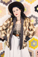 Women's vintage 1960's Hopper Furs, St. Louis label long sleeve open front cardigan jacket with all over patchwork multicolored fur and a rib knit trim.