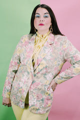 Women's vintage 1980's Elizabeth Williams, Made in USA label long sleeve floral print blazer with one button closure. All over pink, yellow, and tan flowers.