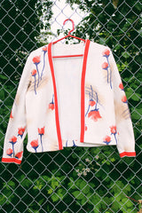 Women's vintage 1970's Puritan Forever Young label matching set. Short sleeve midi length dress and matching long sleeve open front cardigan in polyester. Cream with all over red floral print.