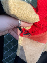 Men's or women's vintage 1970's Made exclusively for Collageman label long sleeve pullover sweater with suede front and a collar. Black, red, yellow, and blue collars.