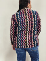 Women's vintage 1980's Graff Petite, Made In USA label long sleeve open front nubby acrylic cardigan sweater with a multicolored zig zag print.