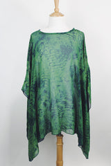 Women's vintage 1990's green and navy sheer polyester material cape top. Has no armholes, just a hole for your head. Tie dye print.
