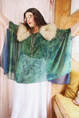 Women's vintage 1990's green and navy sheer polyester material cape top. Has no armholes, just a hole for your head. Tie dye print.