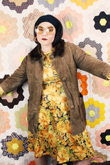 Women's vintage 1960's Emerald Fine Fashions label 3/4 arm length long tan suede mod style jacket with genuine fur trim around neck.