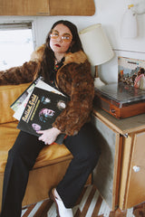 Women's vintage 1980's Dino Ricco, Made in Hong Kong label long sleeve zip up brown genuine fur coat with cream fur neckline.