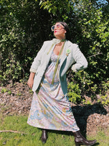 Women's vintage 1970's sleeveless ankle length maxi dress. Nightgown loungewear style with an all over pink, green, and blue pastel colored print.