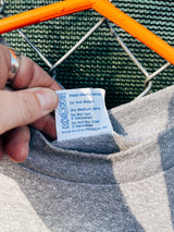 Women's or men's vintage 1983 Super Shirts, Made in USA label Medium short sleeve heather grey t-shirt with cartoon cat graphic on the front in blue, black, and white.