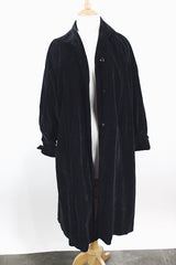 Women's vintage 1950's "365" by All-State label long sleeve knee length black velvet duster jacket with button front closure and pink satin liner.