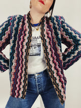 Women's vintage 1980's Graff Petite, Made In USA label long sleeve open front nubby acrylic cardigan sweater with a multicolored zig zag print.