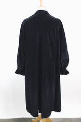 Women's vintage 1950's "365" by All-State label long sleeve knee length black velvet duster jacket with button front closure and pink satin liner.