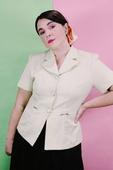 Women's vintage 1990's Sweet Suit label short sleeve button up blazer with double lapel and silver metal detail. In a light green and white all over checkered print.