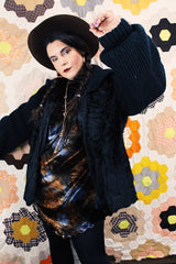 Women's vintage 1980's Luh - London, Paris, New York label long sleeve zip up jacket in black with genuine fir body and ribbed knot arms. Balloon shaped arms.