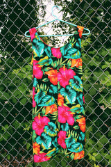 Women's vintage 1980's LA Belle, Made in USA label sleeveless mini dress in black with all over multicolored tropical floral print. Wrap tie detail in the front