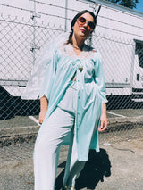 Women's vintage 1980's Fashion by Becky Sharpe, Made in USA label light blue nightie top with short sleeves and lace trim throughout.