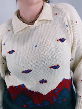 long sleeve cream pullover sweater with collar and mountain print