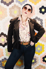 Women's vintage 1970's Stephanie, K by Koret label long sleeve button up blouse with small dagger collar in tan color and all over pale pink paisley print.