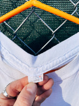 Women's or men's vintage 1990's short sleeve white t-shirt with a multicolored world cup soccer graphic on the front.