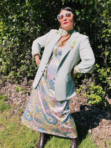 Women's vintage 1970's sleeveless ankle length maxi dress. Nightgown loungewear style with an all over pink, green, and blue pastel colored print.