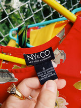 Women's vintage 1990's NY & CO label sleeveless mini dress in a lightweight polyester material in red with all over multicolored floral print.