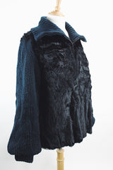 Women's vintage 1980's Luh - London, Paris, New York label long sleeve zip up jacket in black with genuine fir body and ribbed knot arms. Balloon shaped arms.