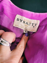 Women's vintage 1970's Dynasty label long sleeve long length velvet material puffy duster jacket in black, purple, and pink colors.