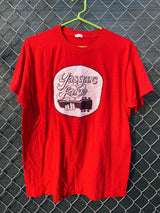 Women's or men's vintage 1970's Screen Stars, Made in the USA label short sleeve red graphic t-shirt with Yasgur's Farm logo which is the farm where Woodstock took place.