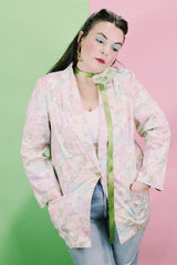 Women's vintage 1980's Sag Harbor label long sleeve lightweight floral print blazer with one gold button closure. White with pink and blue flowers.