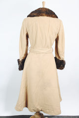 Women's vintage 1970's Domino, New York label long sleeve knee length light tan camel colored wool coat with brown genuine fur trim around collar and cuffs.