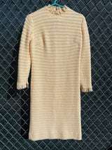 Women's vintage 1970's Maggi label long sleeve short length cream colored crochet dress with lace trim and mock neck.