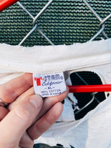 Women's or men's vintage 1980's Star California, Made in Chile label XL short sleeve white graphic t-shirt with Betty Boop on a motorcycle on the front.