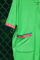 Women's vintage 1980's David Brown for Saks Fifth Avenue short sleeve mini length zip up towel material dress in a vibrant lime green and printed pink trim.
