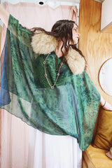 Women's vintage 1990's green and navy sheer polyester material cape top. Has no armholes, just a hole for your head. Tie dye print.